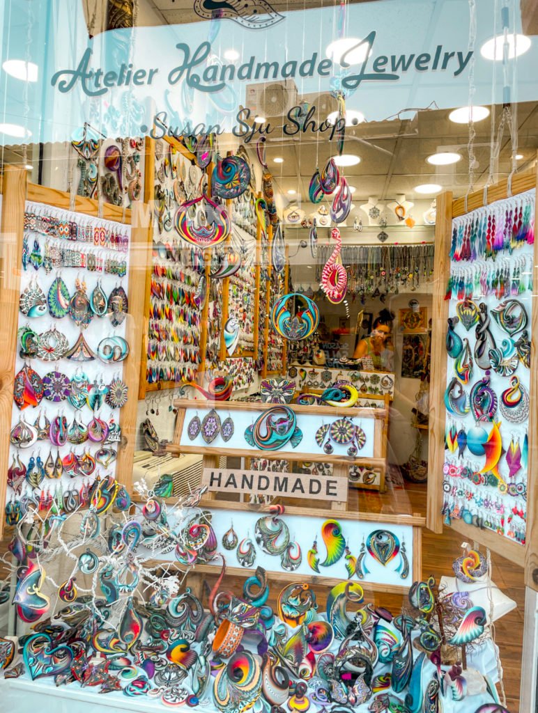 shopping at boutique shops, ways to be a more eco-friendly traveler