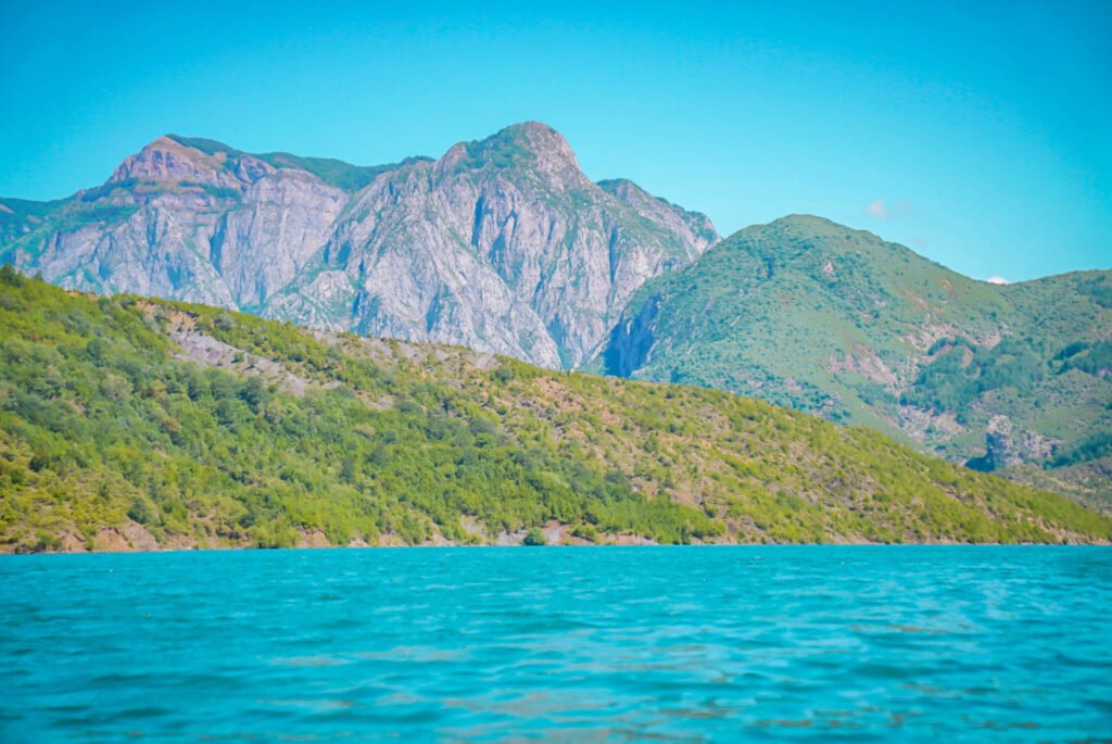 tkaing a boat ride to Lumi i Shales in Albania