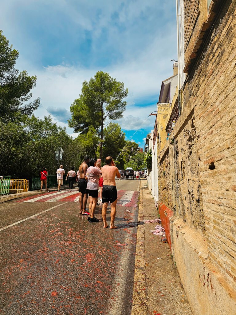 people hosing off after La Tomatina
