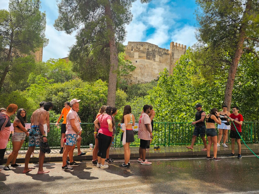 people hosing off after La Tomatina
