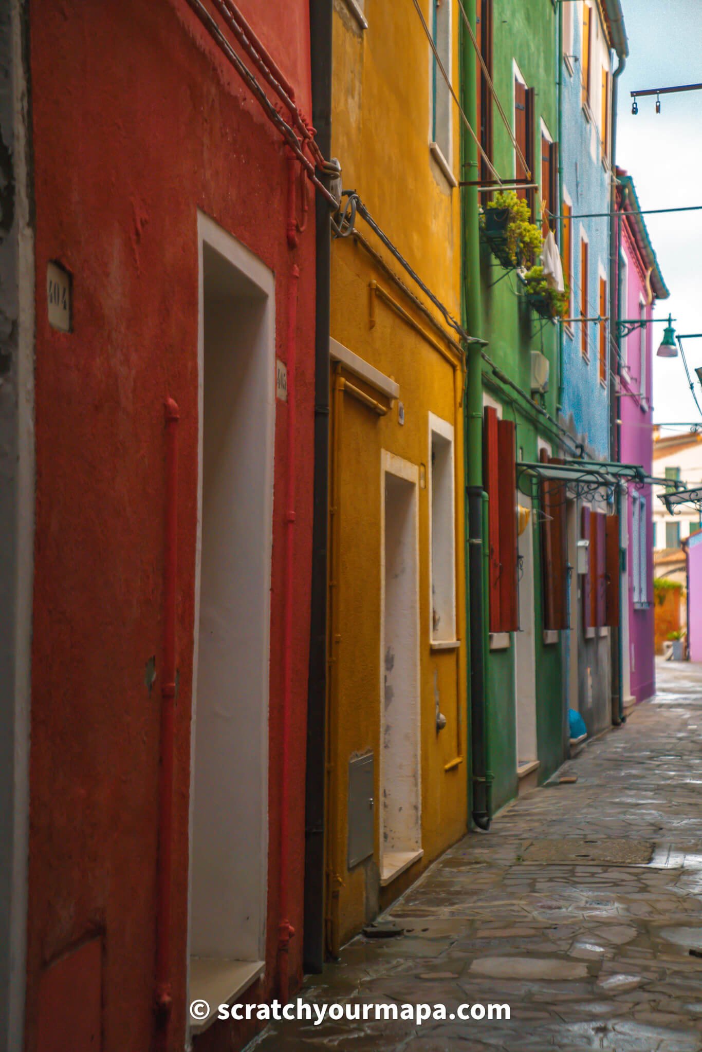 rainbow street on the island of Burano in Venice