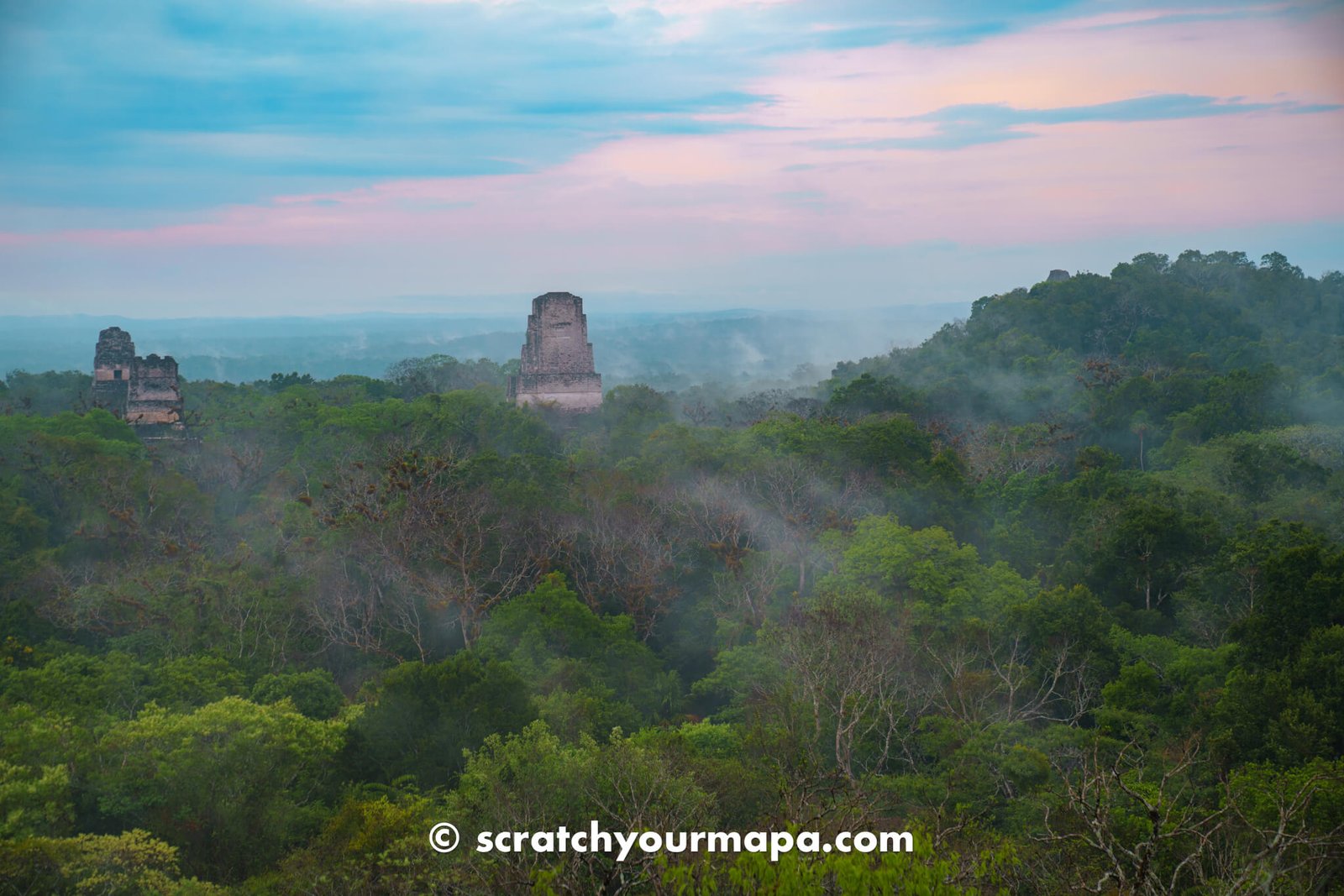 watching the sunrise at Templ IV in TIkal, Guatemala