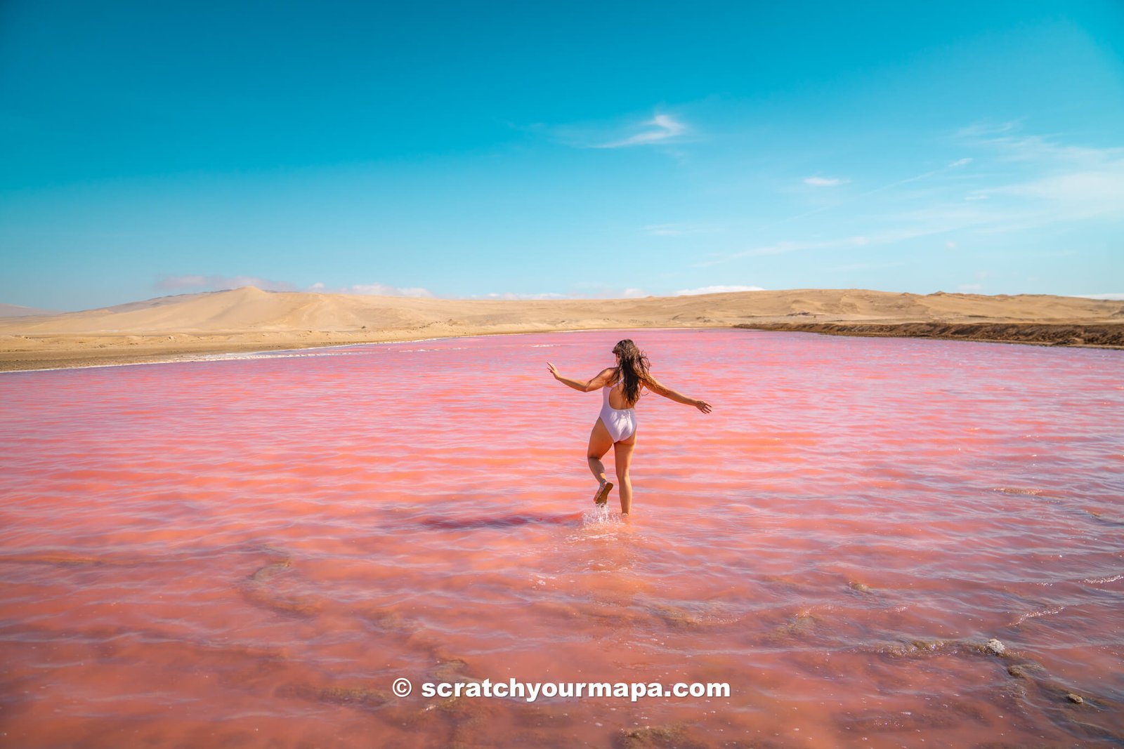 pink lake in Paracas National Reserve, Peru