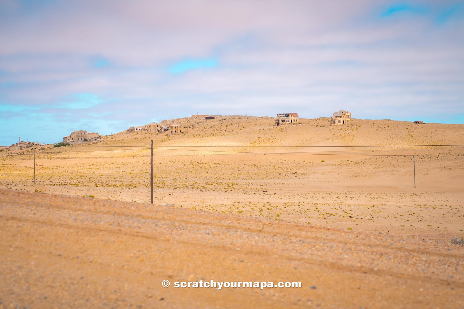 abandoned buildings in the Kolmanskop ghost town of Namibia