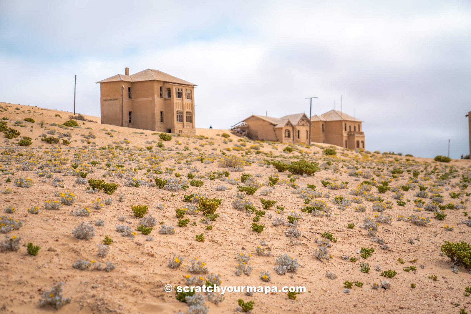 abandoned buildings in the Kolmanskop ghost town of Namibia