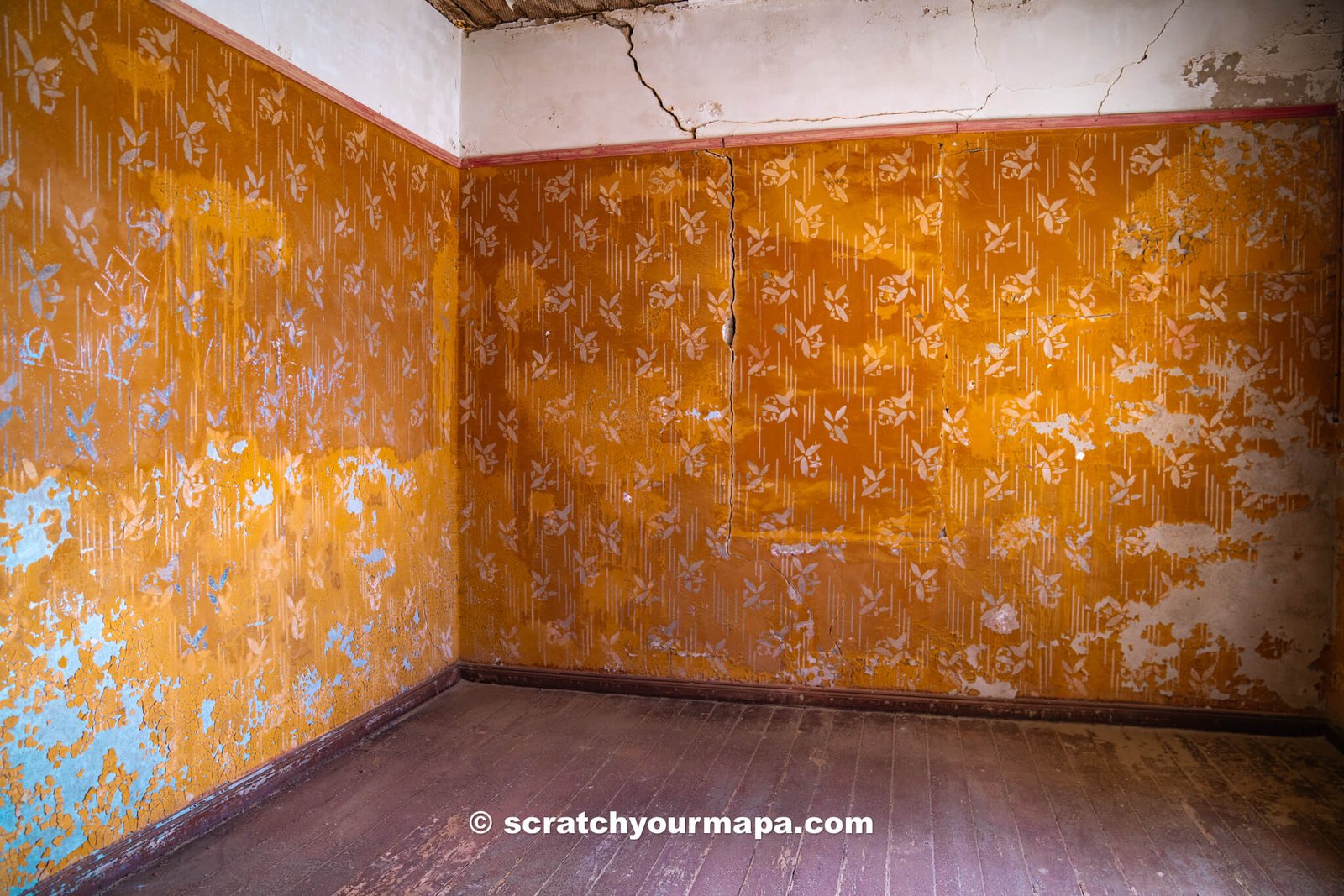 abandoned building in the Kolmanskop ghost town of Namibia