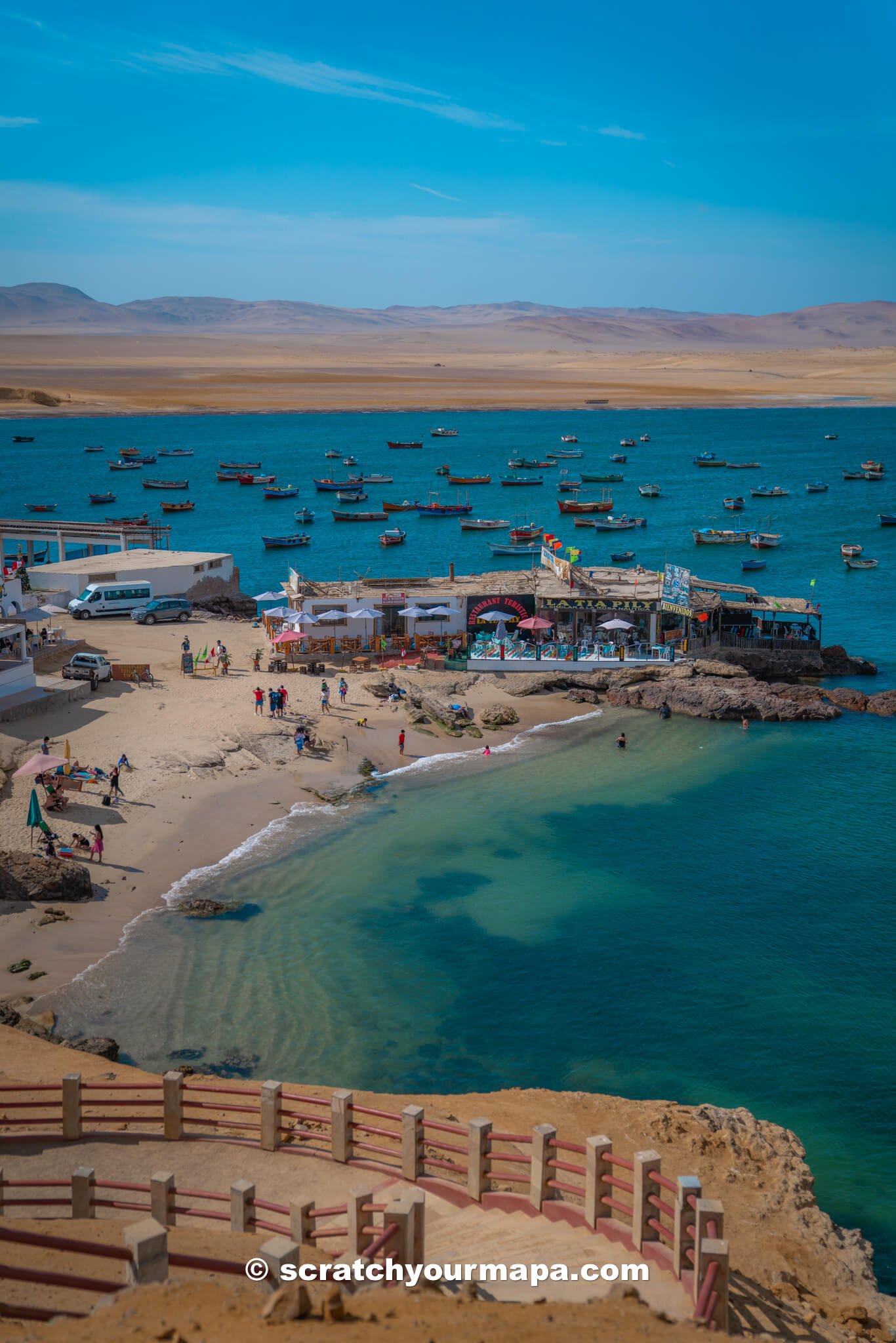 crowds at Lagunillas in Paracas National Reserve, Peru