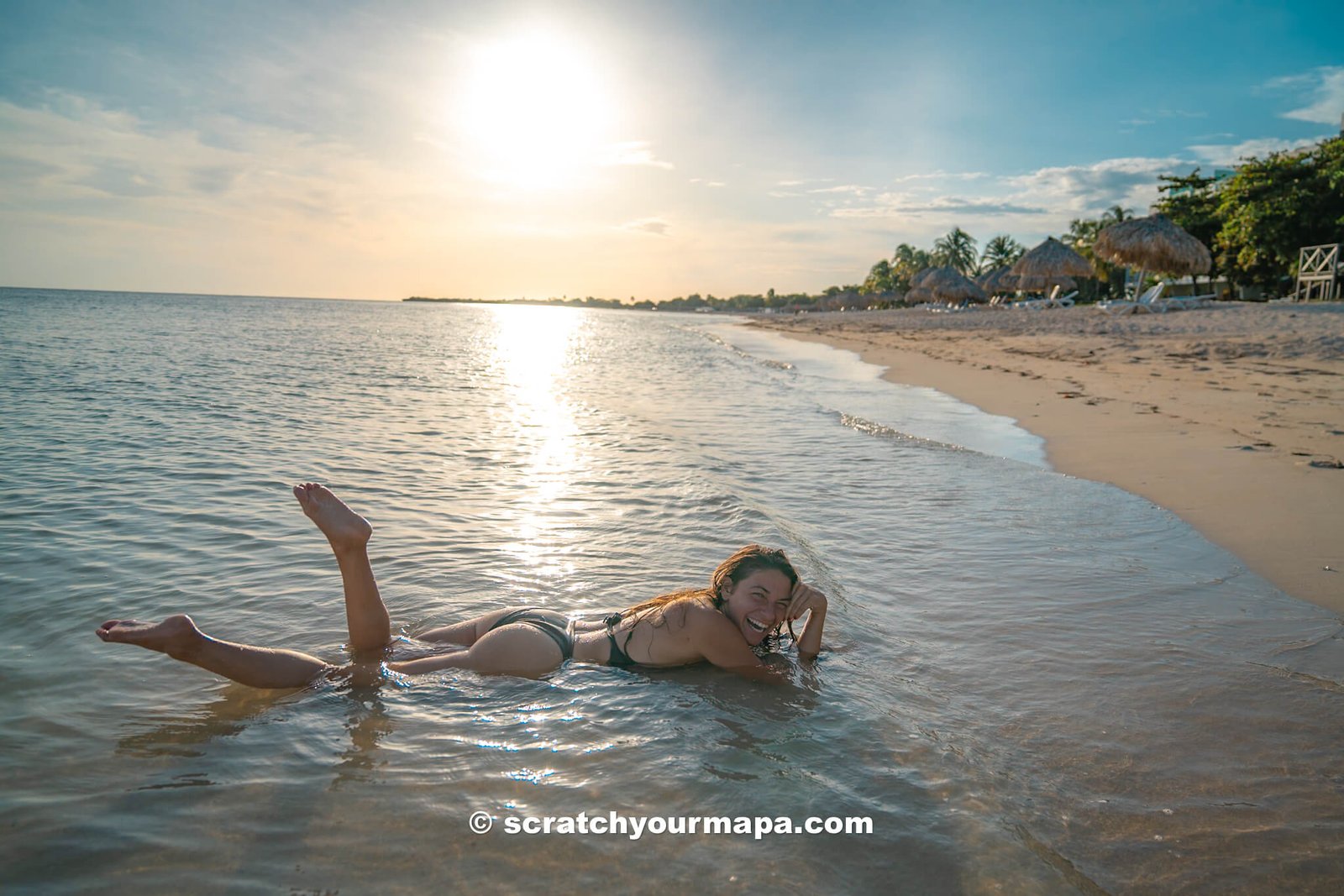 Danni relaxing in the ocean at Playa Ancon beach, one of the top things to do in Trinidad, Cuba