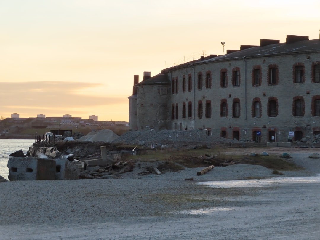 A large building sitting next to a body of water