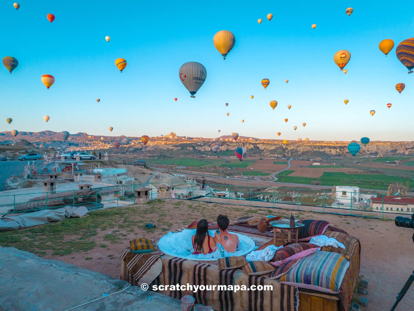 rooftop jacuzzi with hot air balloon views - unique activities in Cappadocia