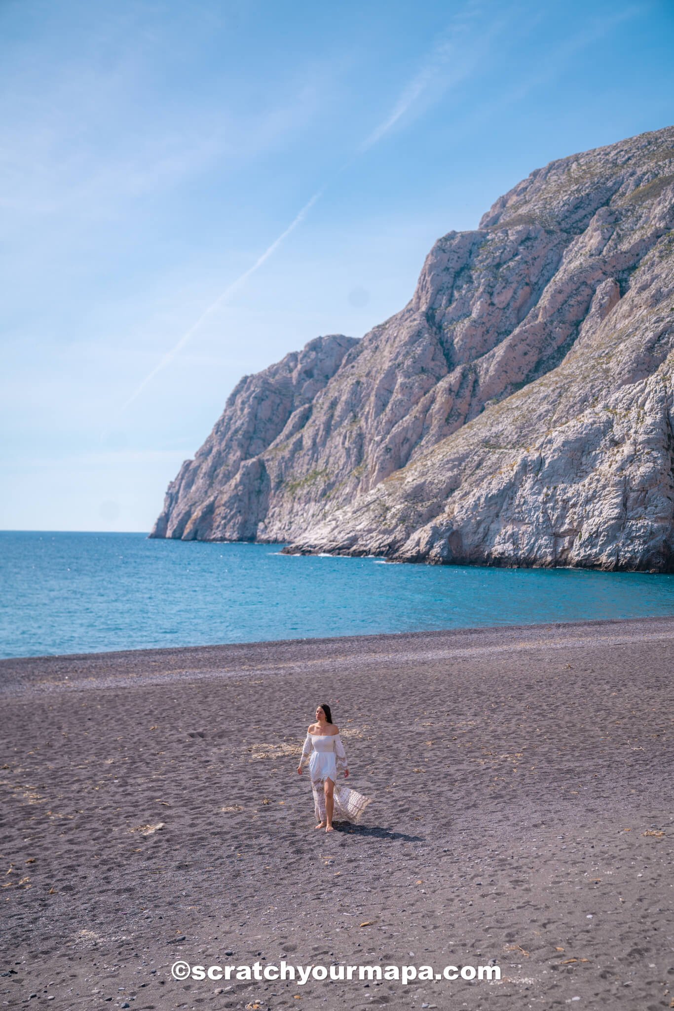 Perivolos black sand beach - best photo spots in Santorini