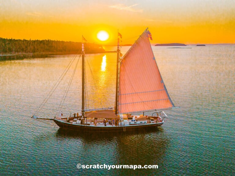 rolled sleeping pad, sleeping bag, and small pillow