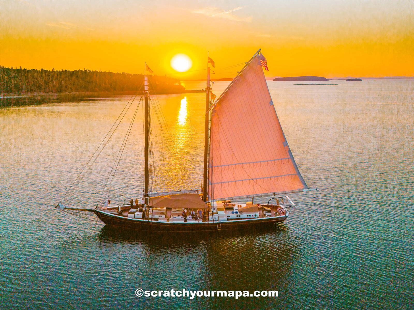 rolled sleeping pad, sleeping bag, and small pillow