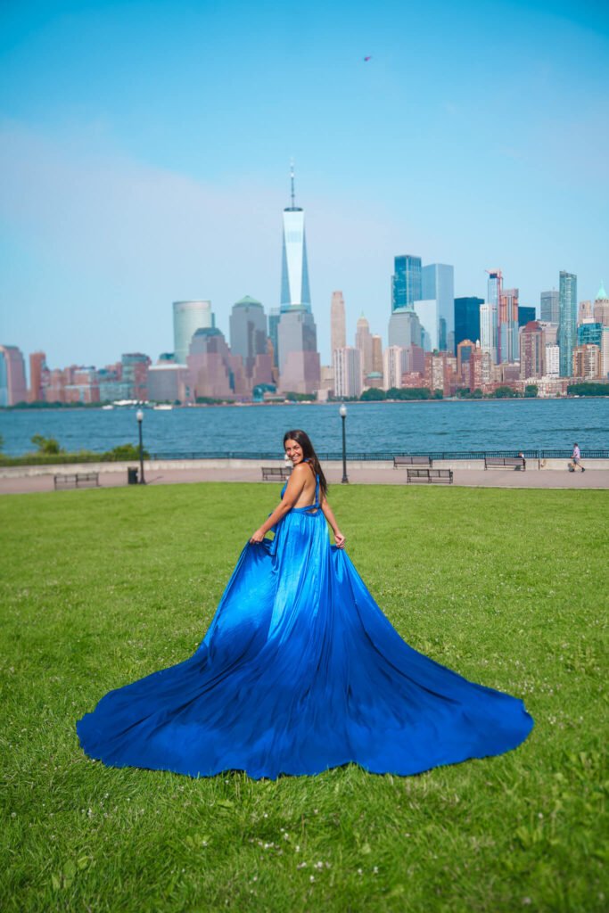 photoshoot with flying dresses new york in front of the NYC skyline