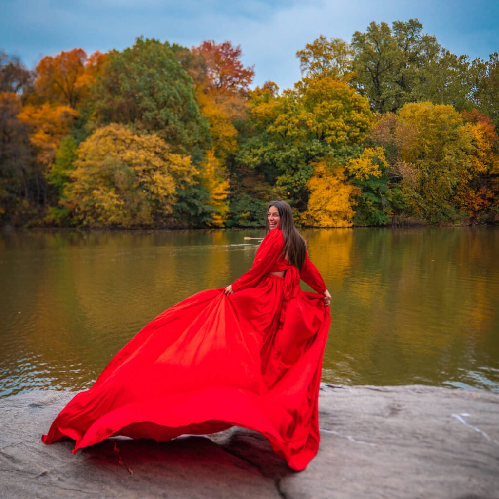 fall foliage photography with a red flying dress